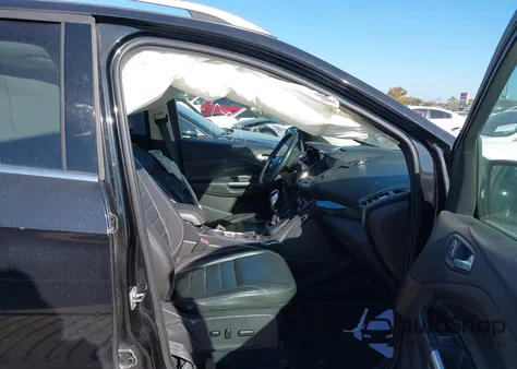 2015 Ford Escape Titanium z USA, uszkodzony, nr VIN 1FMCU0JX9FUC66062